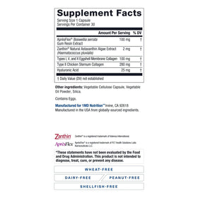 1MD Nutrition MoveMD capsules à côté d'un verre d'eau