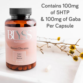 A close-up of BLYSS Nutrition 5-HTP Plus GABA capsules