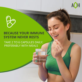 ADAPTOHEAL daily wellness capsules en main