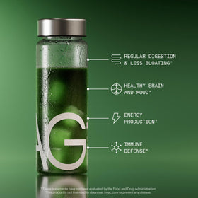 AG1 Superfood et Probiotique contenu en poudre avec cuillère