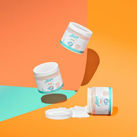 Alani Nu Poudre de Créatine Monohydrate 240g en mélange dans un verre