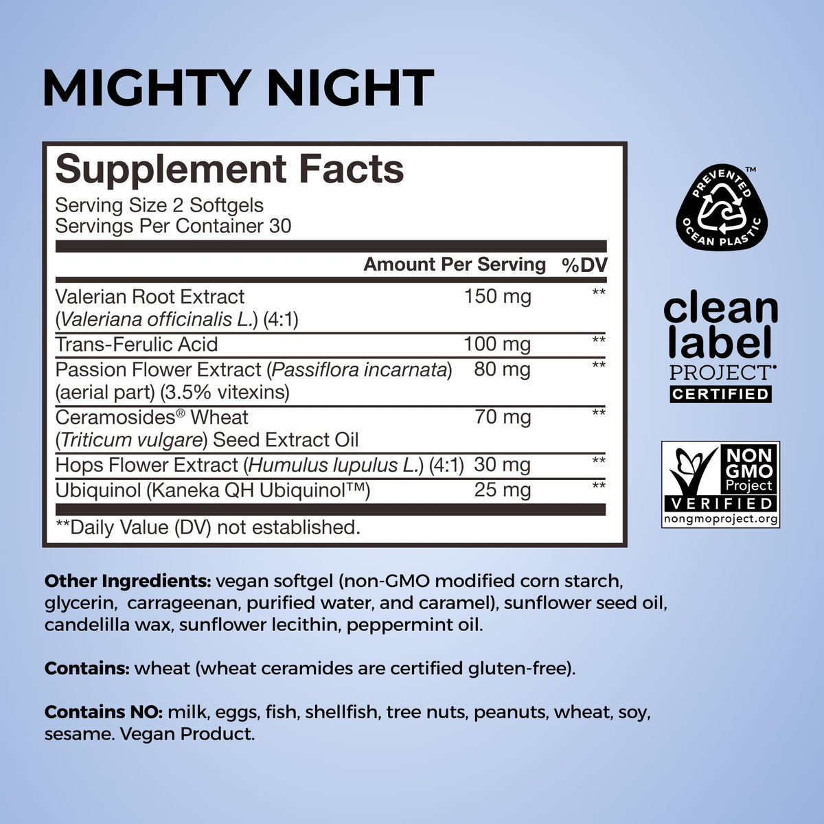Ambiance nocturne avec flacon HUM Mighty Night à côté d'une tasse de tisane