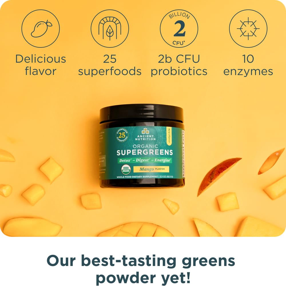 Ancient Nutrition Poudre Super Greens Bio Mangue 159g dans un bol avec des fruits