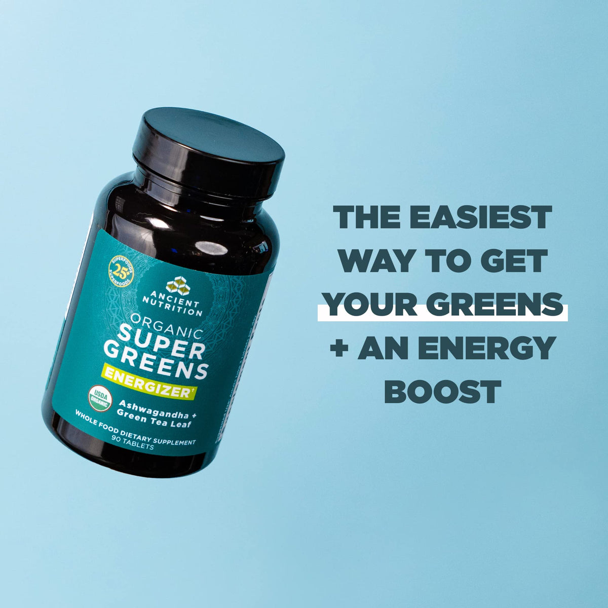 Ancient Nutrition Super Greens capsules sur une table en bois