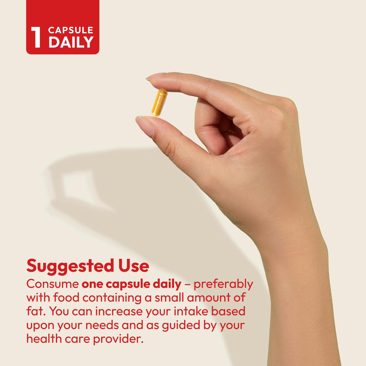 ANDREW LESSMAN Coenzyme Q-10 capsules in a hand