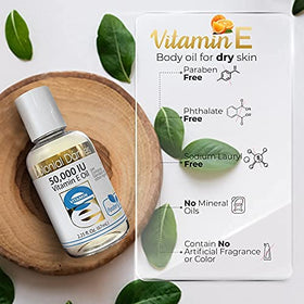 Application d'Huile de Vitamine E 50 000 UI sur les mains