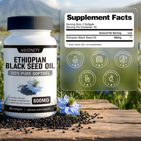 ASISTNETY huile de graines noires éthiopienne capsules dans une main