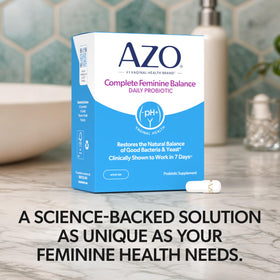 AZO Équilibre Féminin avec un verre d'eau
