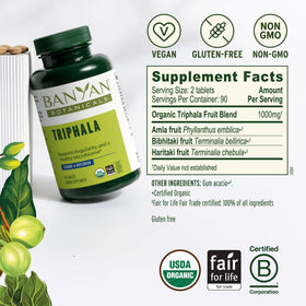 Banyan Botanicals Triphala Bio comprimés sur une surface