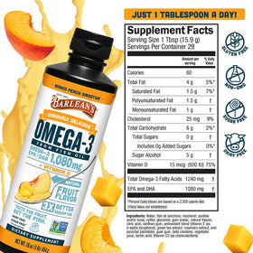 Barlean's Huile de Poisson Omega-3 Mangue Pêche sur une table