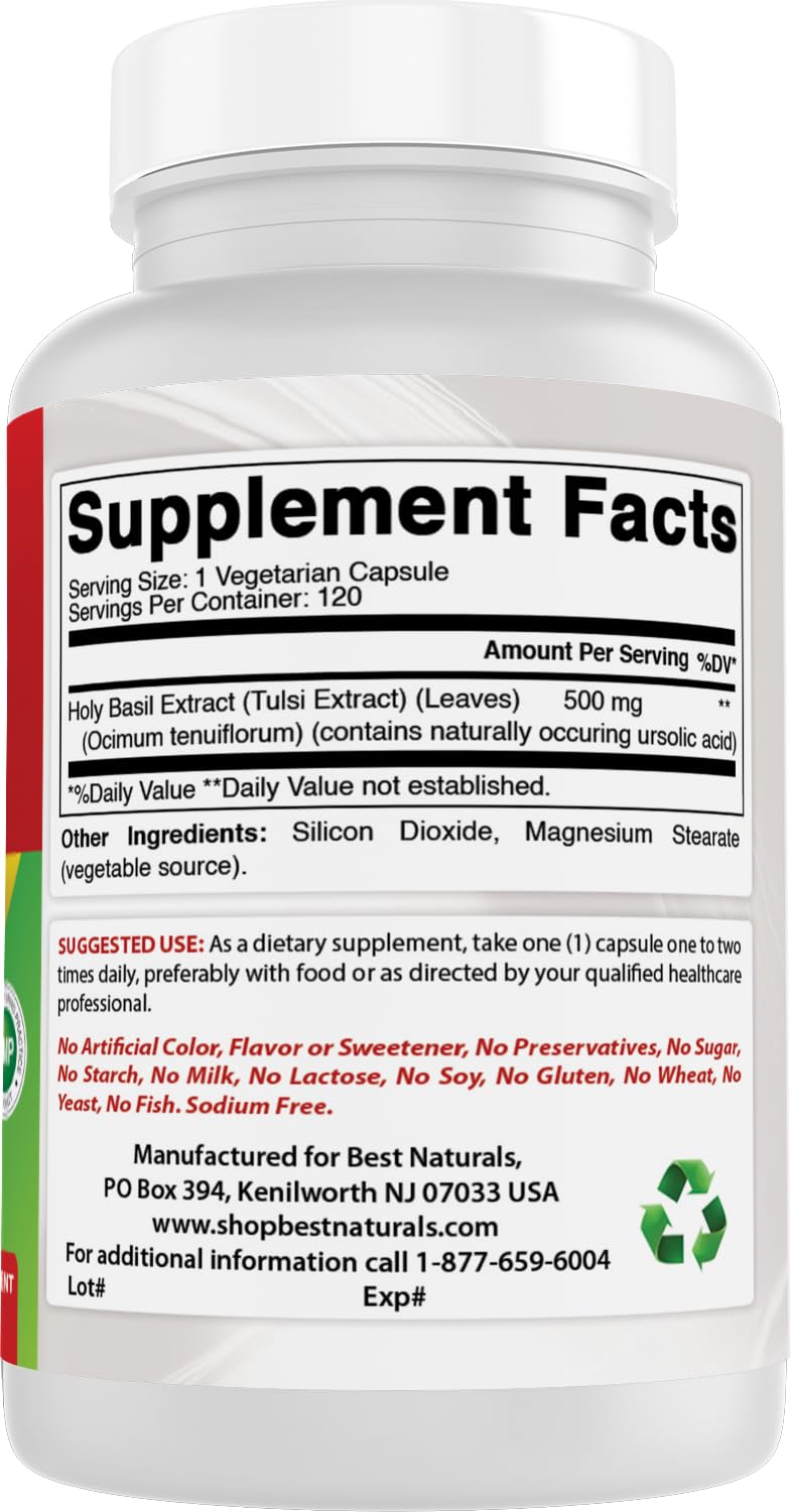 Basilic Sacré Best Naturals capsules sur une cuillère en bois