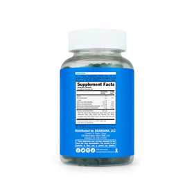BEARVANA Gummies Multivitamines Femme gummies à côté d'un verre d'eau