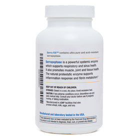 Biomedic Labs RX Serra-RX 260 000 SU Serrapeptase capsules sur une surface blanche