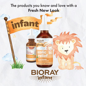 BIORAY NDF Colic Relief bouteille sur une table avec accessoires pour bébé