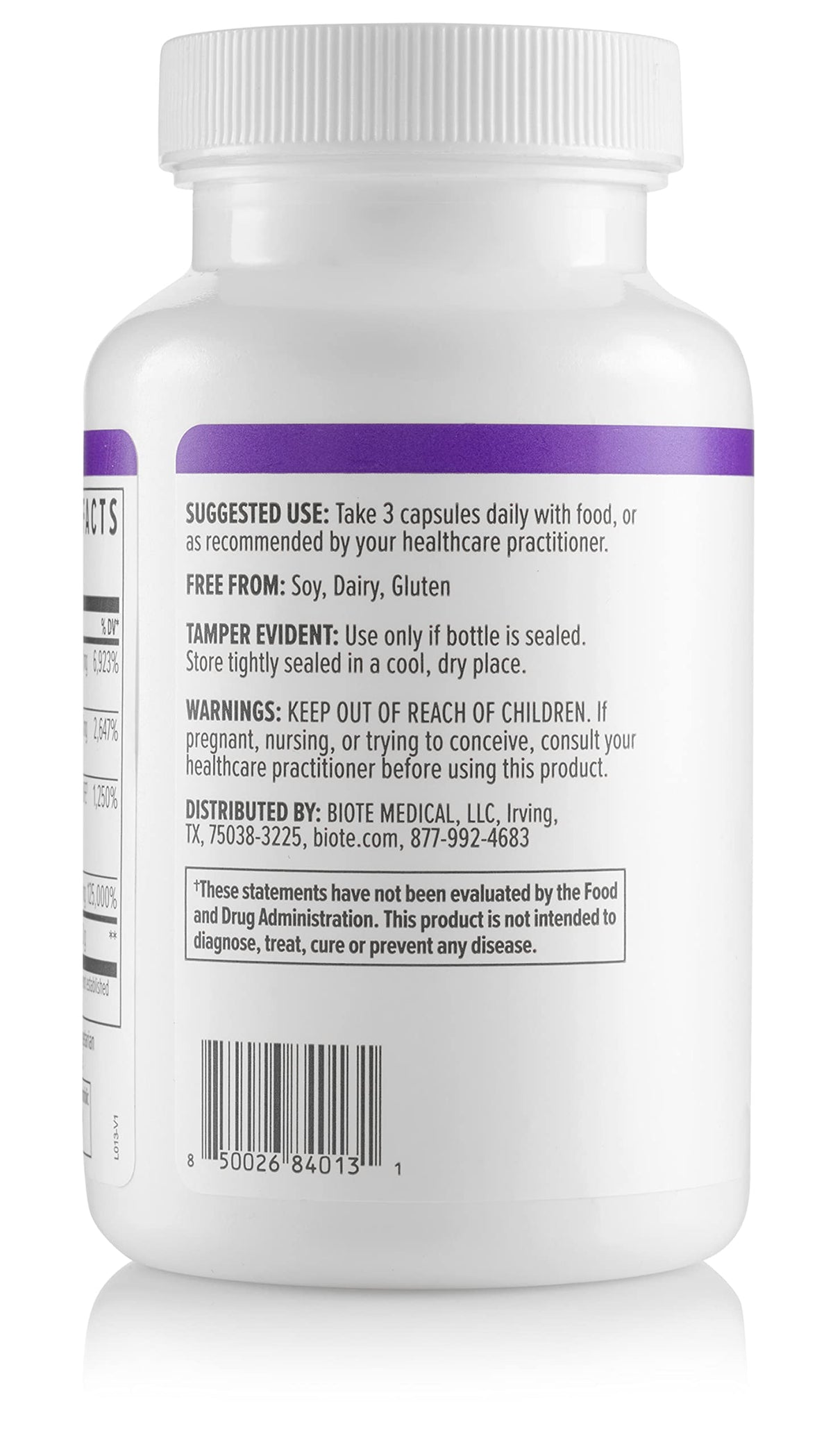 Biote Methyl Factors+ capsules à côté d'un verre d'eau
