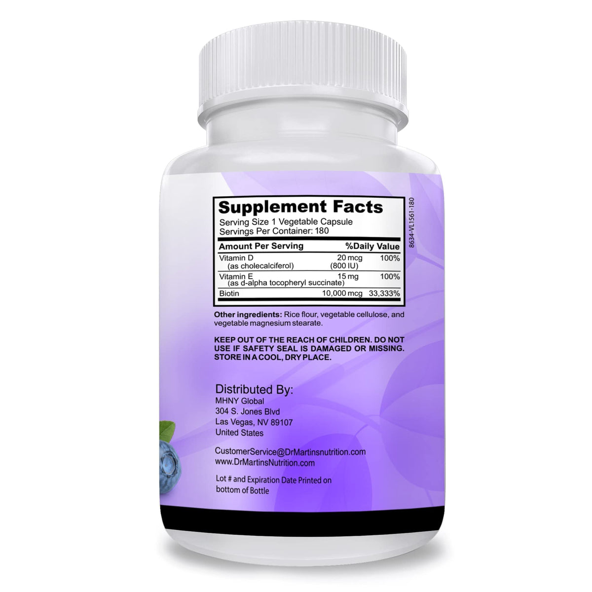 Biotine 10000mcg D3 et E sur une table en bois