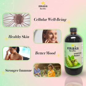Bitters de Graviola Maia Herbs avec un verre et une cuillère