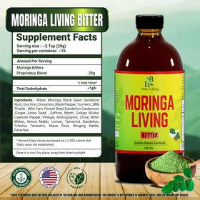 Bitters de Moringa Herb To Body sur une table en bois