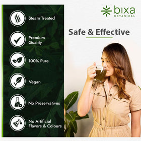 Bixa BOTANICAL Poudre de Punarnava sur une table en bois