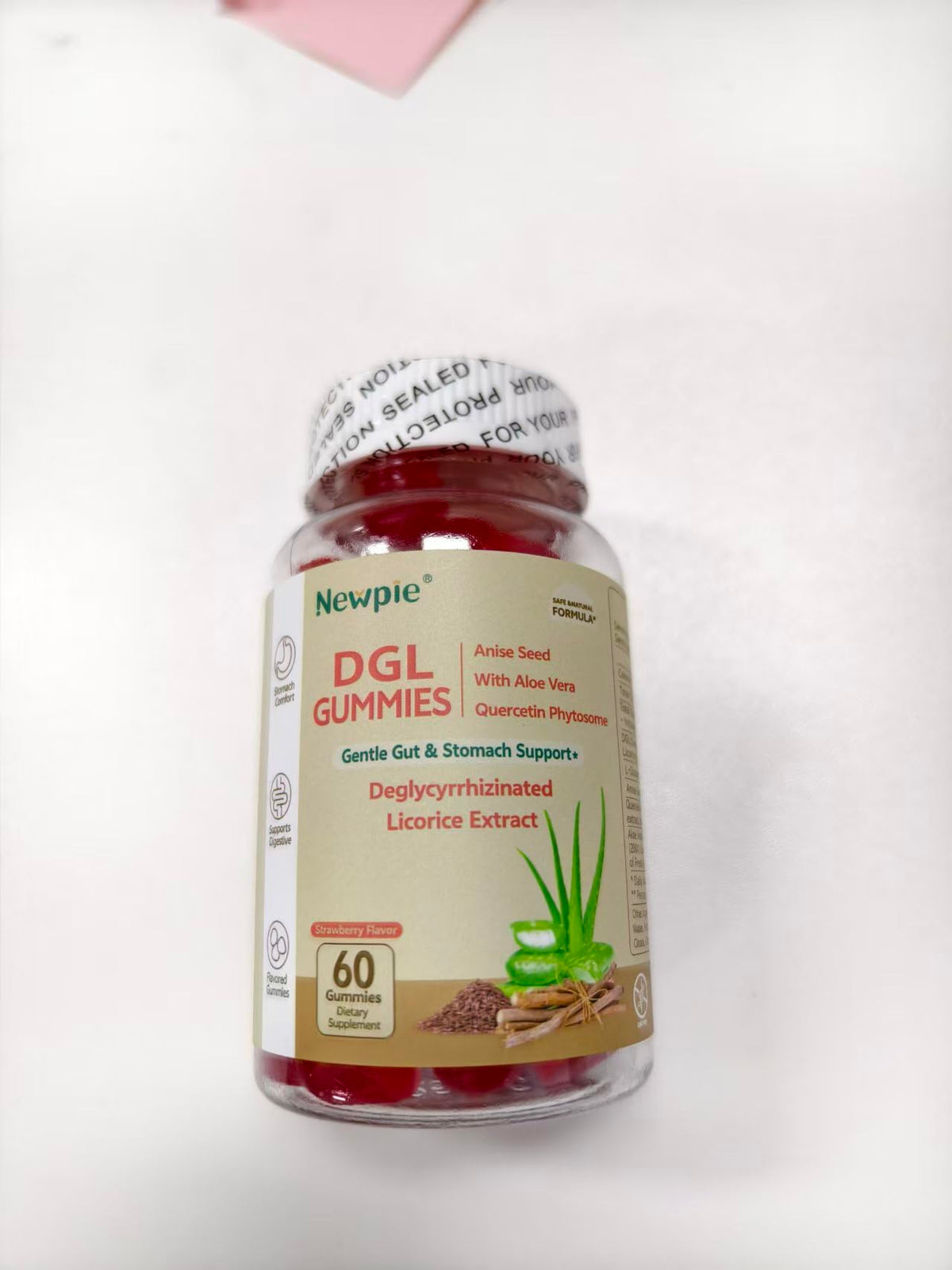 Blltzzz Gummies DGL, ambiance de consommation avec un verre d'eau