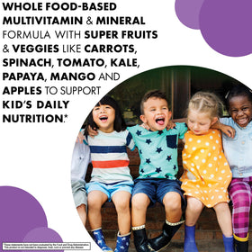 BlueBonnet Multivitamines Animaux de la Forêt sur une table avec des fruits