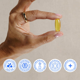 BodyBio Balance Oil 399g et des graines de lin sur une surface de cuisine