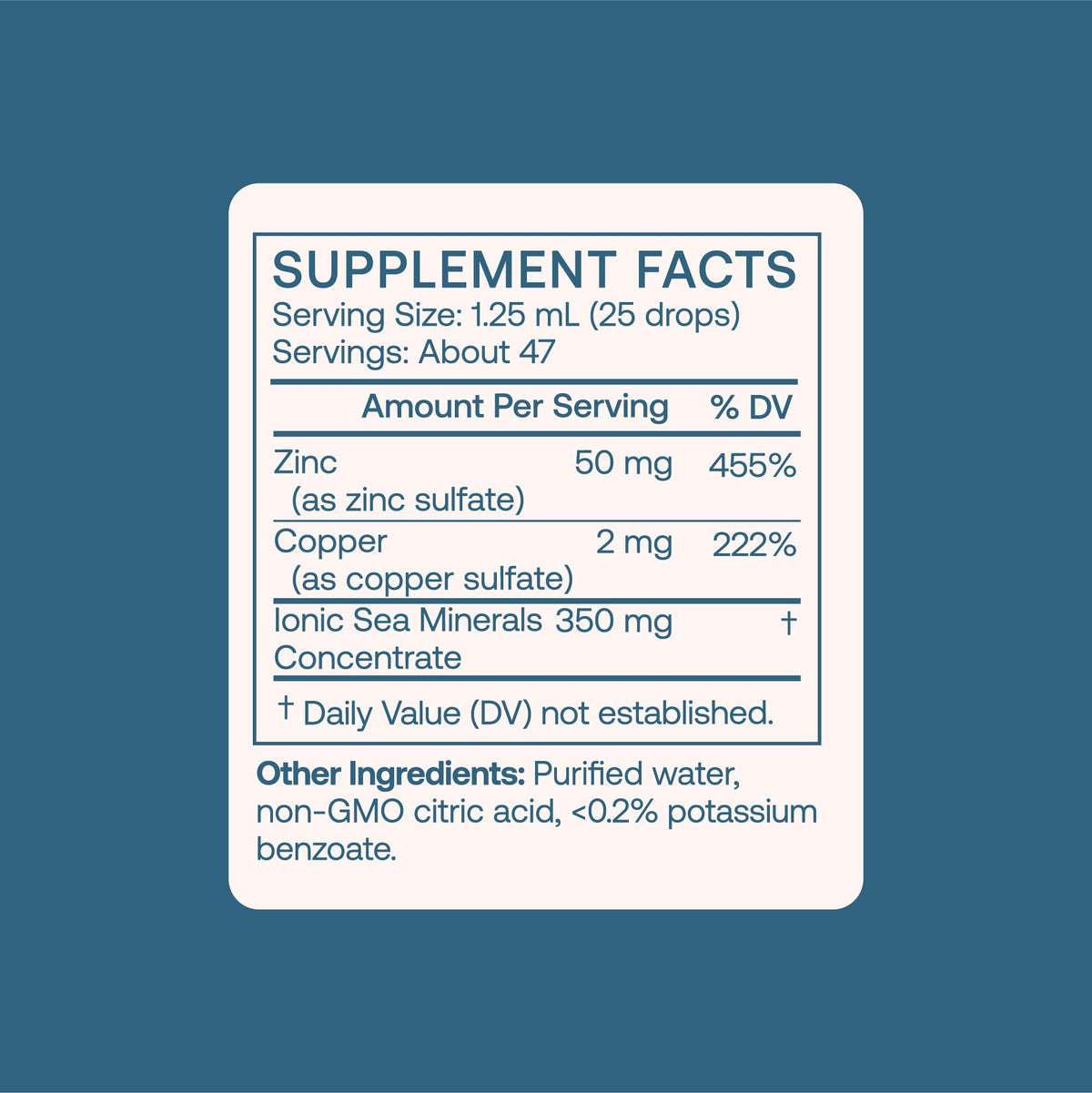 BodyBio Zinc Liquide 82g sur une table avec un verre