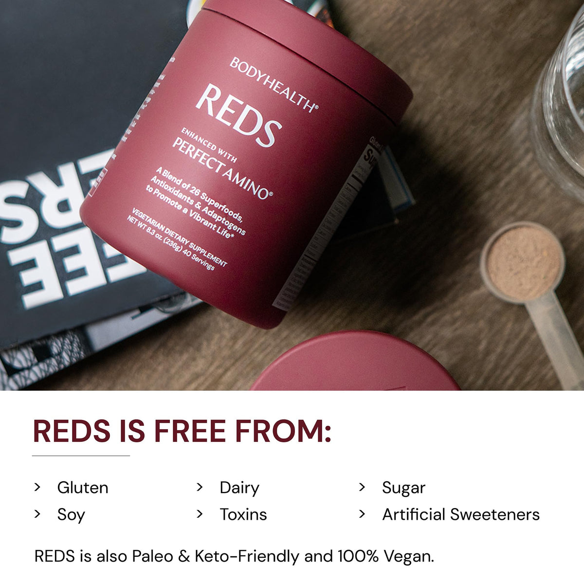 BodyHealth Perfect Reds 322g avec des baies fraîches en arrière-plan