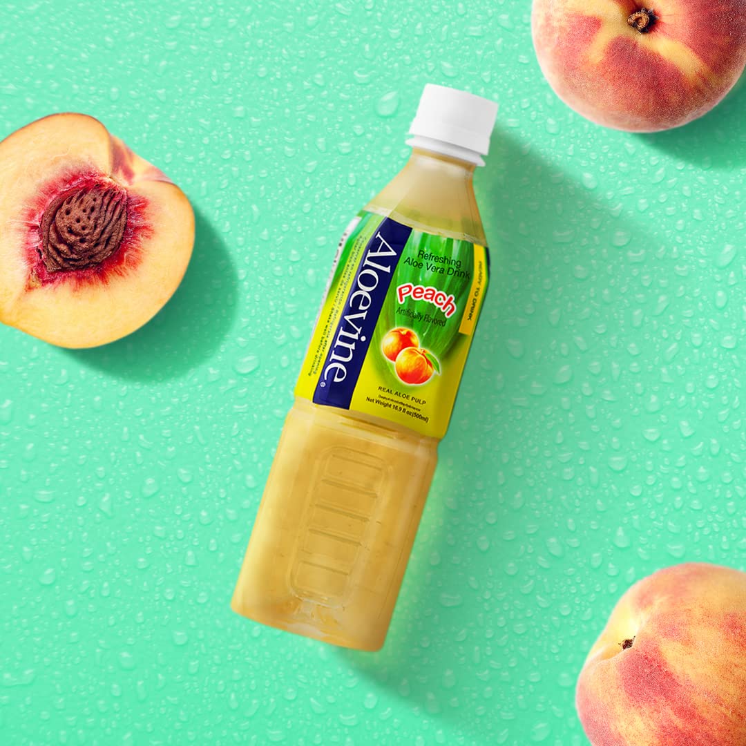 Boisson Aloe Vera Aloevine à la pêche servie dans un verre