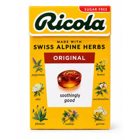 Bonbons Ricola aux herbes disposés sur une table
