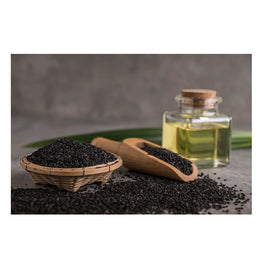 Bouteille ambrée d'huile de graines noires Halaleveryday avec étiquette visible