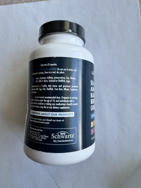 Bouteille BioSchwartz ouverte avec gélules à côté