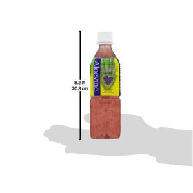 Bouteille d'Aloevine Aloe Vera au raisin sur une table