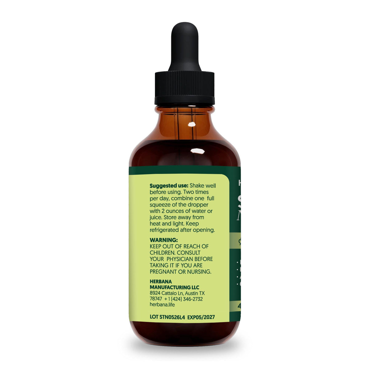 Bouteille d'extrait d'ortie HERBANA à côté d'ingrédients naturels