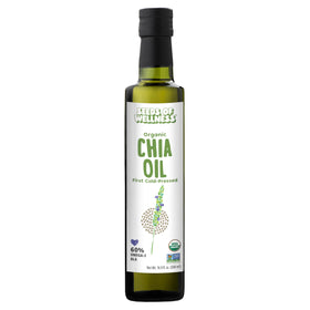 Bouteille d'huile de graines de chia bio sur une table en bois