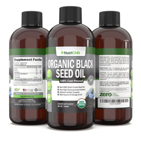 Bouteille d'huile de graines noires NutriONN sur une table en bois