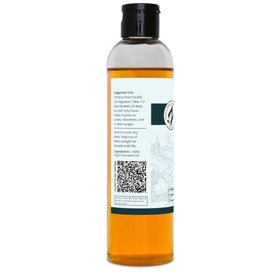 Bouteille d'huile de lin Zatural ouverte pour service