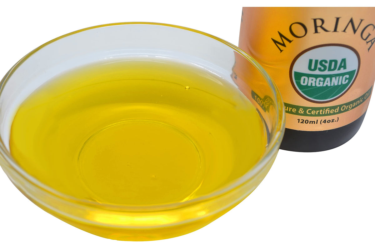 Bouteille d'huile de Moringa Bio 4oz avec arrière-plan naturel