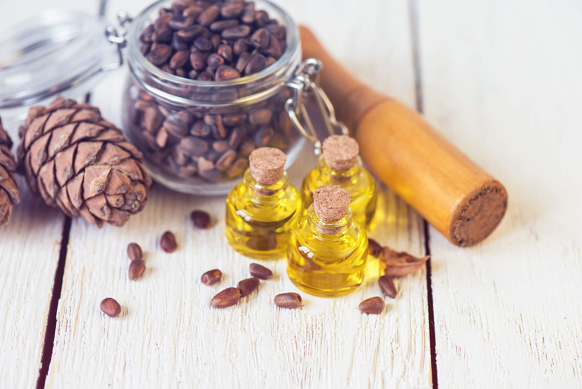 Bouteille d'huile de pignon de pin avec capsules