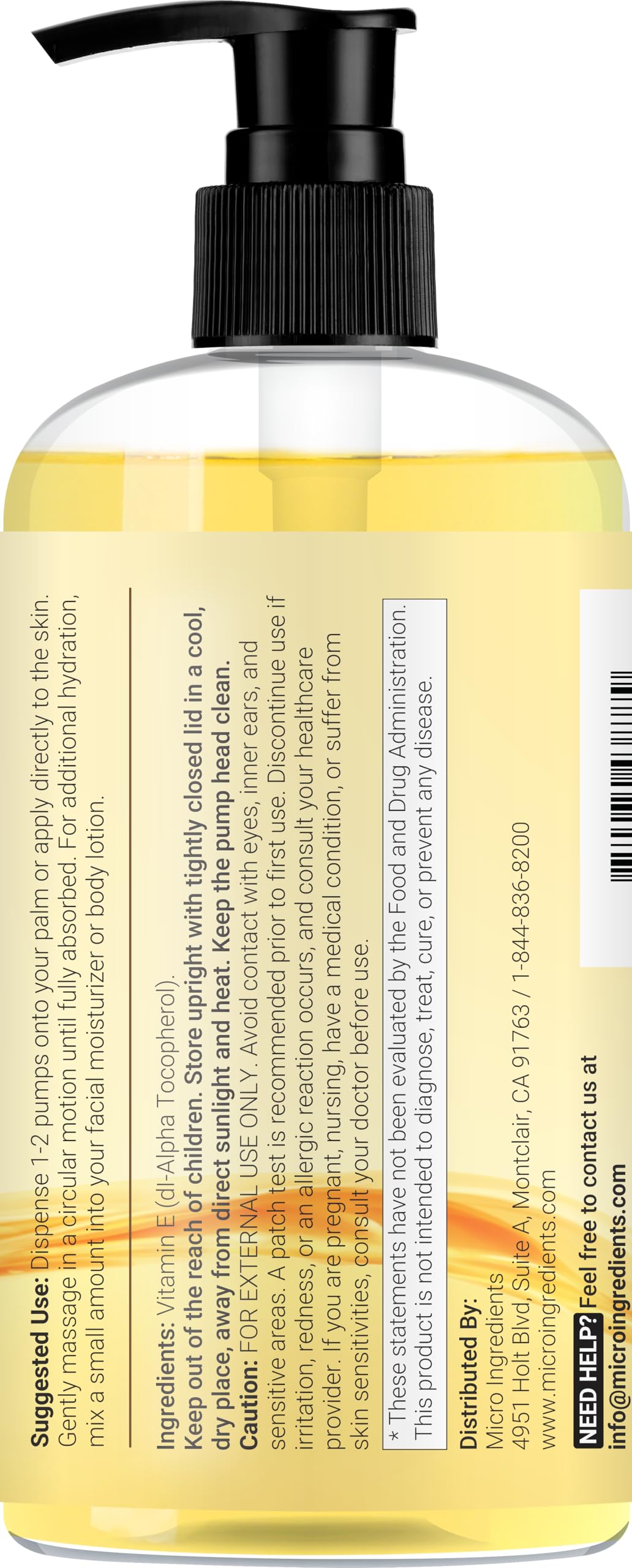 Bouteille d'huile de vitamine E Micro Ingredients en situation