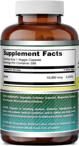 Bouteille de biotine Amazing Nutrition sur une table en bois