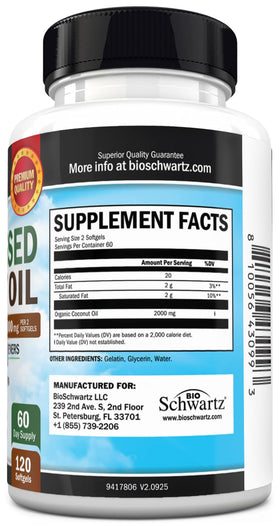 Bouteille de capsules d'huile de coco BioSchwartz sur une table en bois