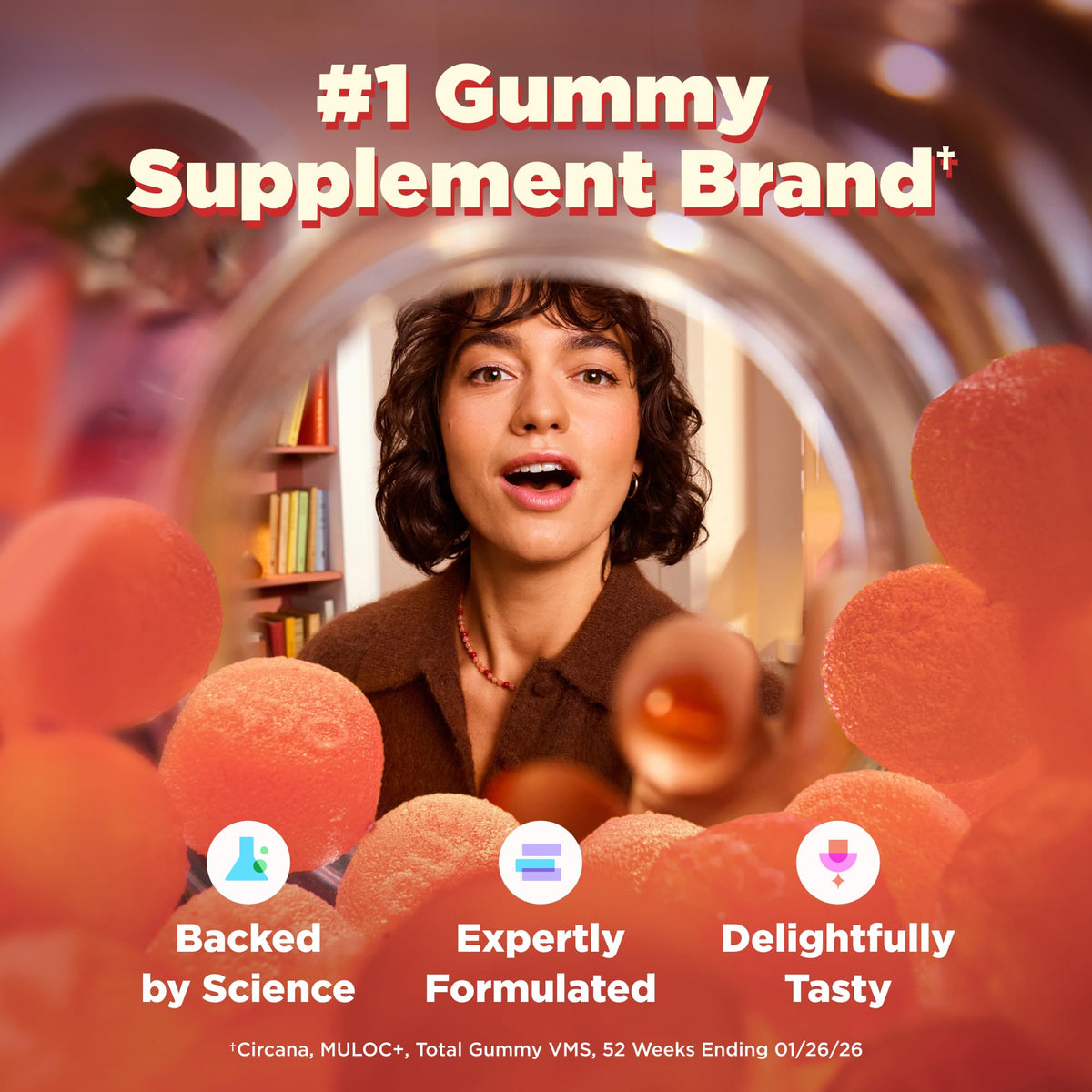 Bouteille de gummies OLLY ouverte, vue des gummies à l'intérieur