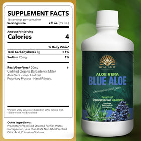 Bouteille de jus d'aloe vera bio sur une table de cuisine