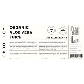 Bouteille de jus d'aloe vera Erbology dans un environnement naturel