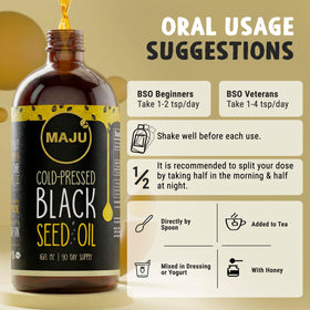 Bouteille de Maju Superfoods Huile de Graines Noires sur table