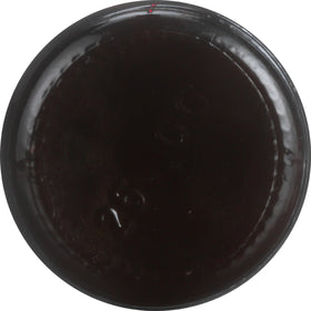 Bouteille de Thé Vert Original Herbasway 100g avec un verre rempli d'eau
