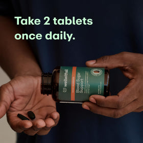 Bouteille de WellWithAll Complément Alimentaire Métabolisme ouverte avec comprimés visibles