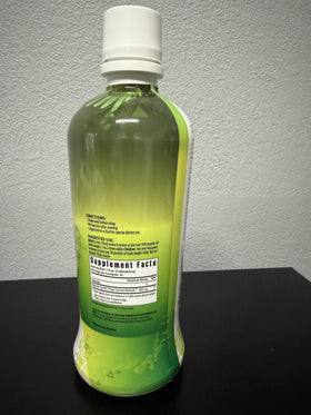 Bouteille de Youngevity complément minéral avec un fond naturel