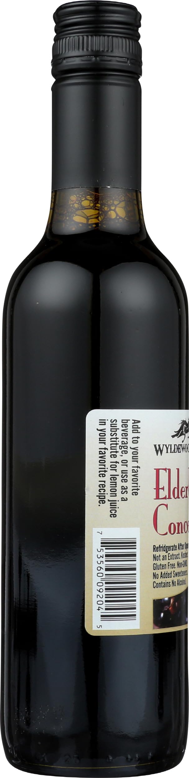 Bouteille du concentré de jus de sureau Wyldewood Cellars avec fond flou